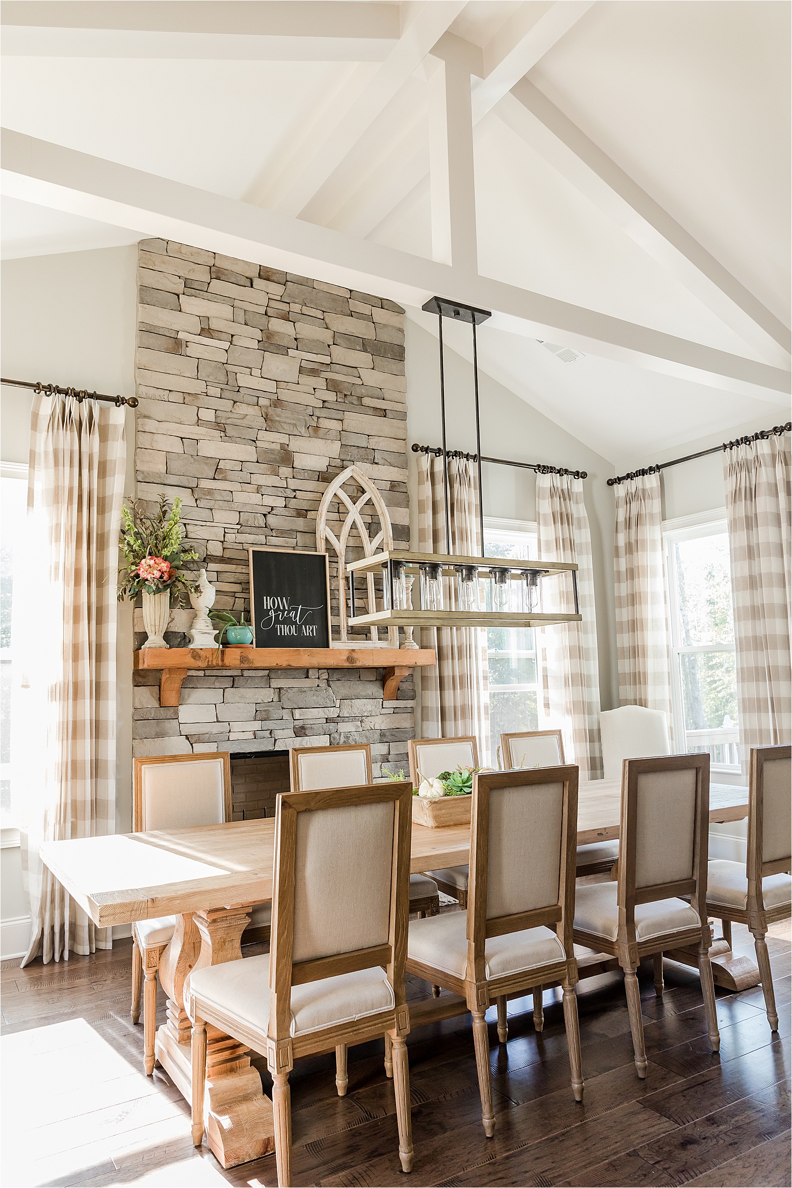 Eat in Kitchen with farmhouse table and stone fireplace