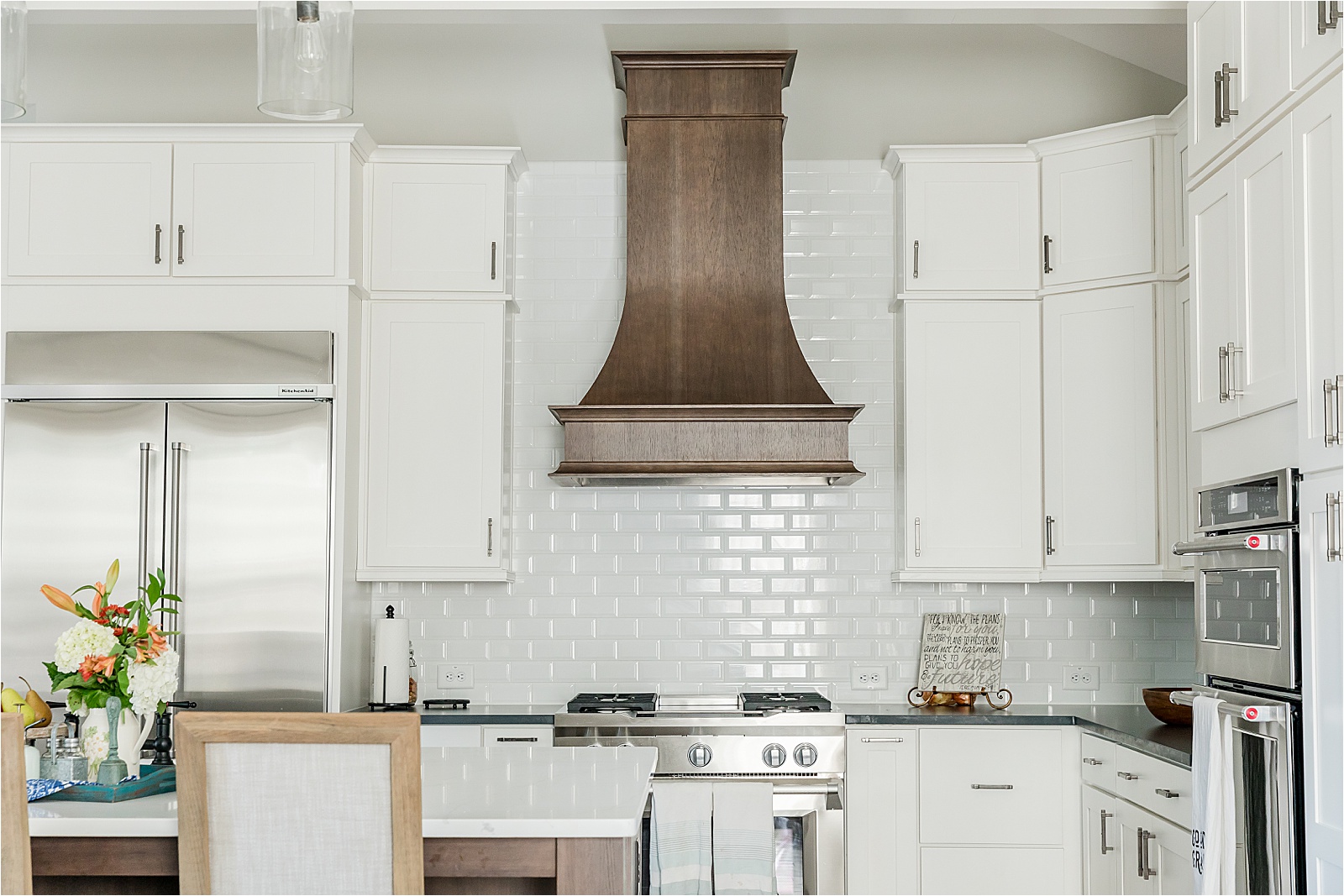 white cabinets and white subway tile kitchen