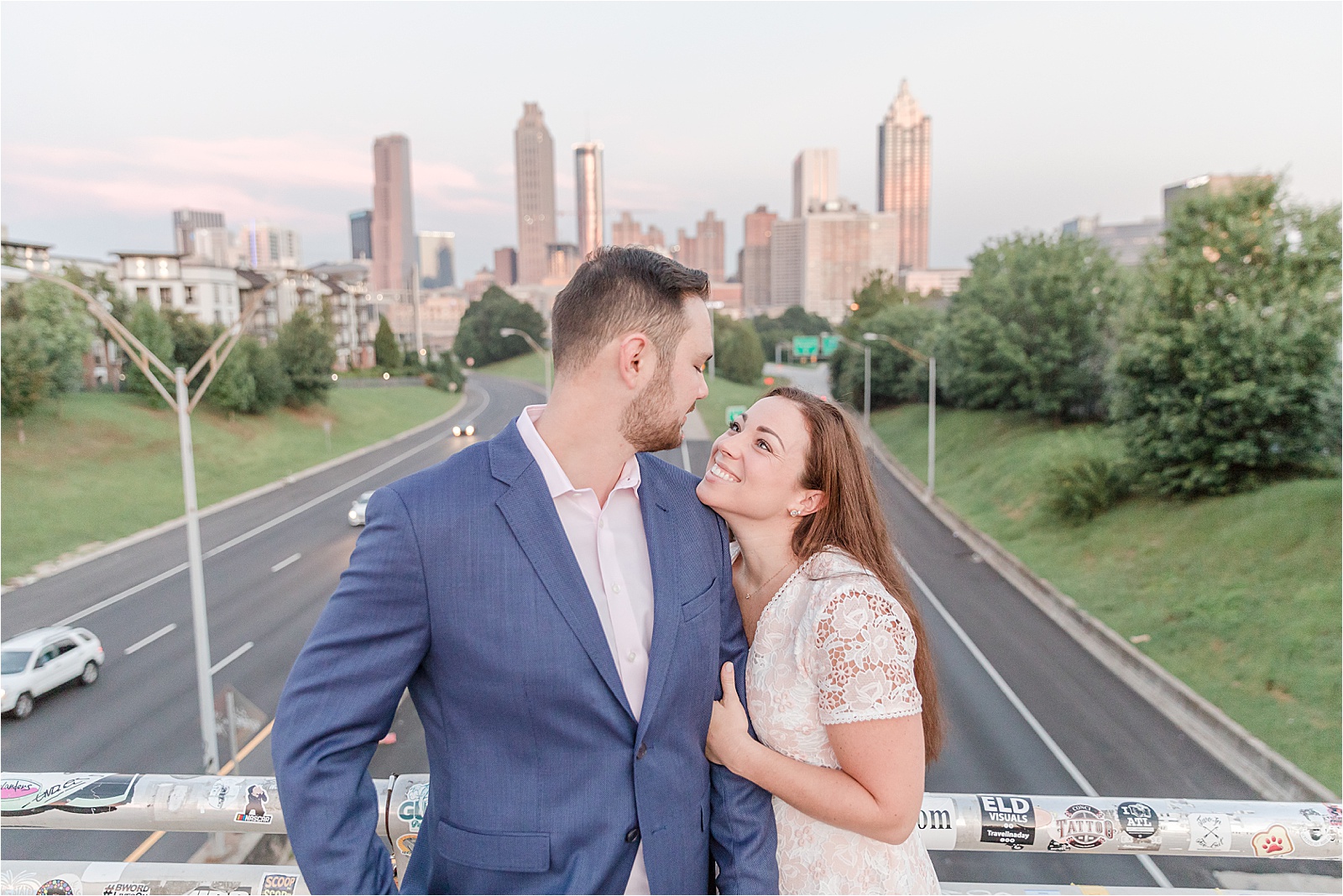 engaged couple on Jackson street bridge
