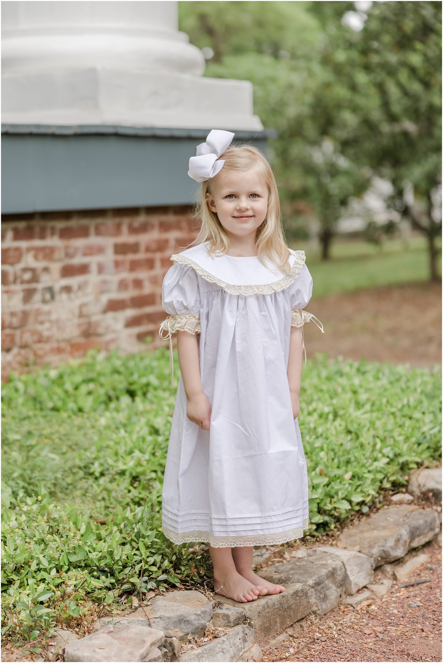Classic southern portraits in an heirloom dress at Bulloch Hall in Roswell Georgia.