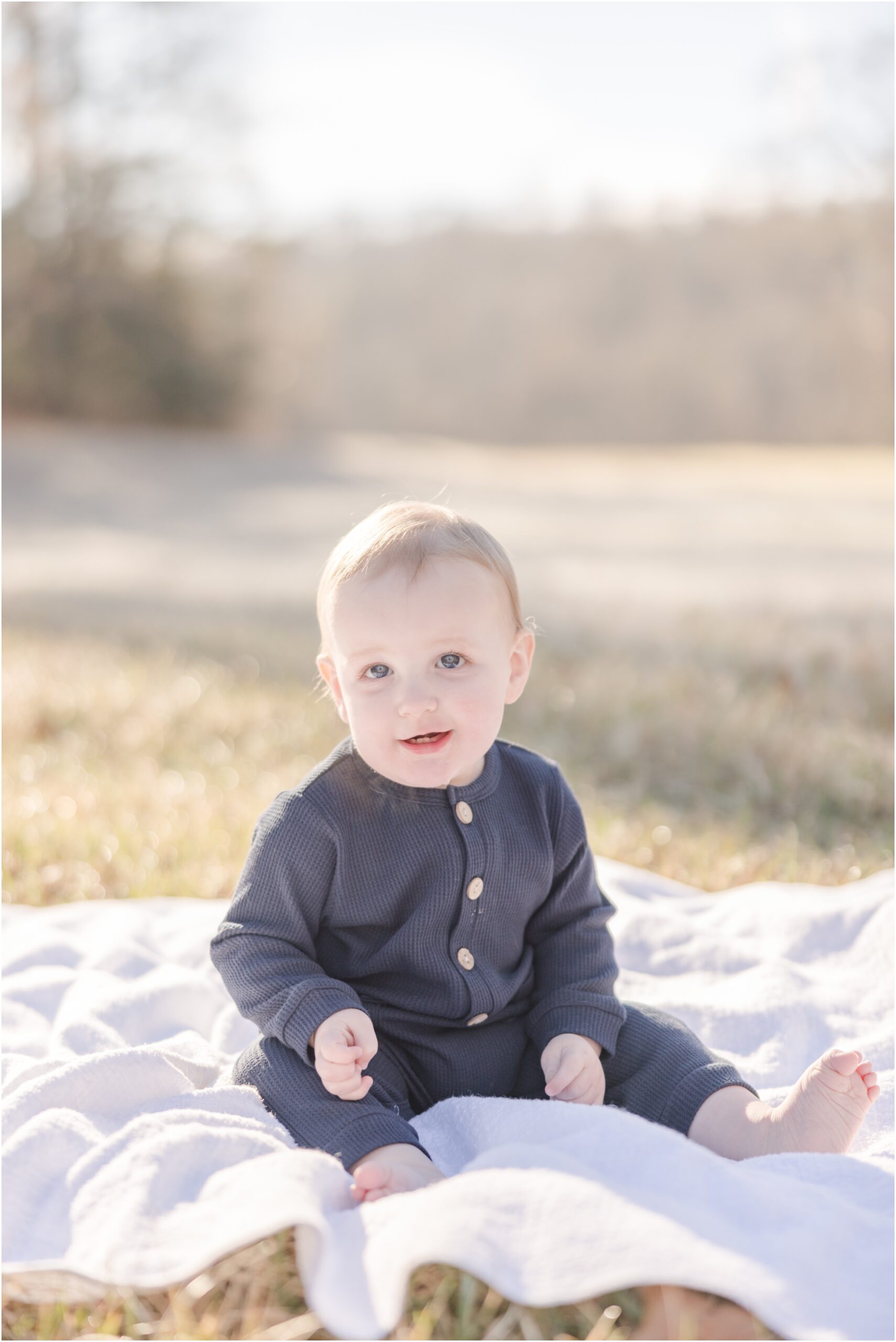 Portrait of a one year old boy on his first birthday by Greenville Photographer.