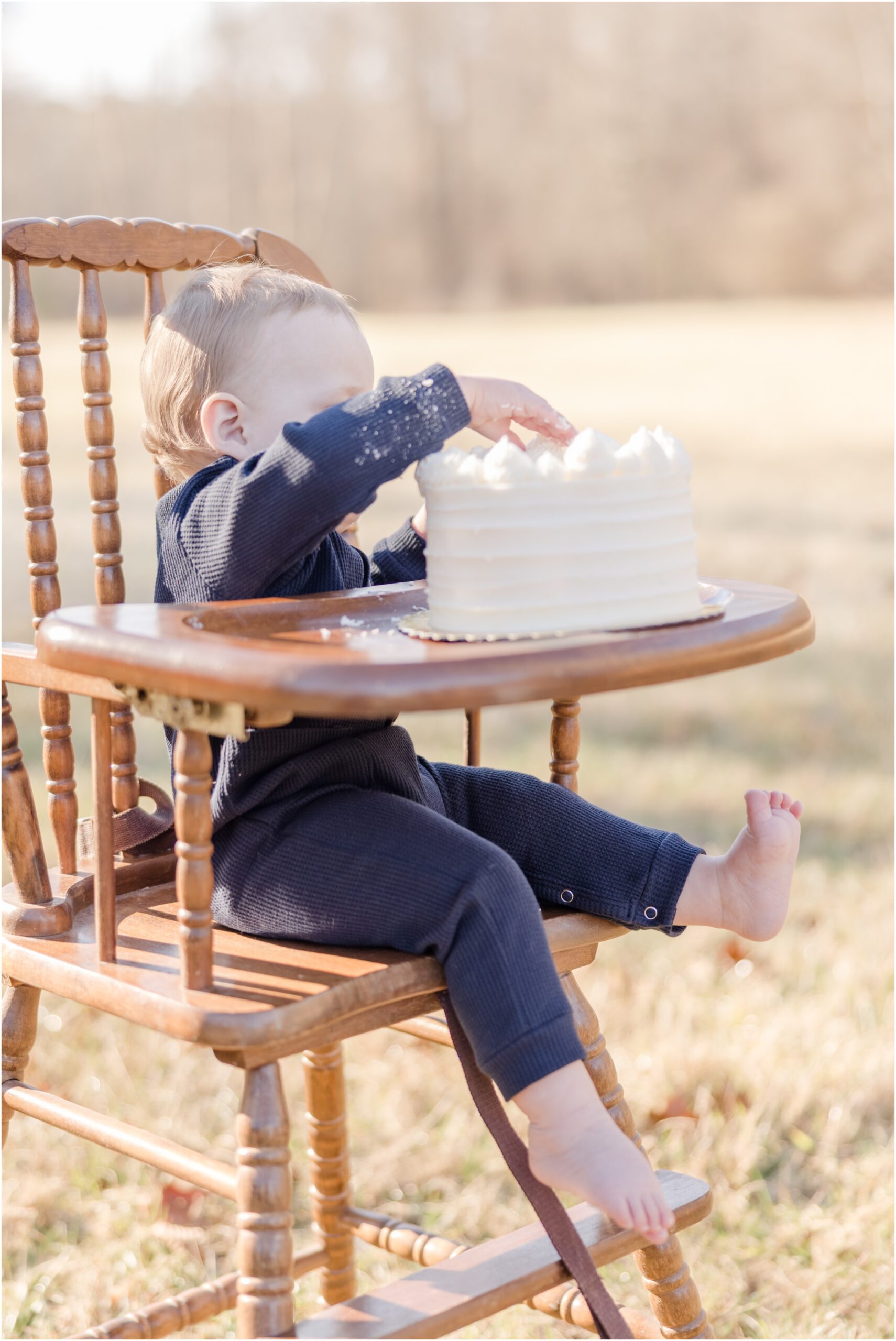 One year old boy cake smash photos.