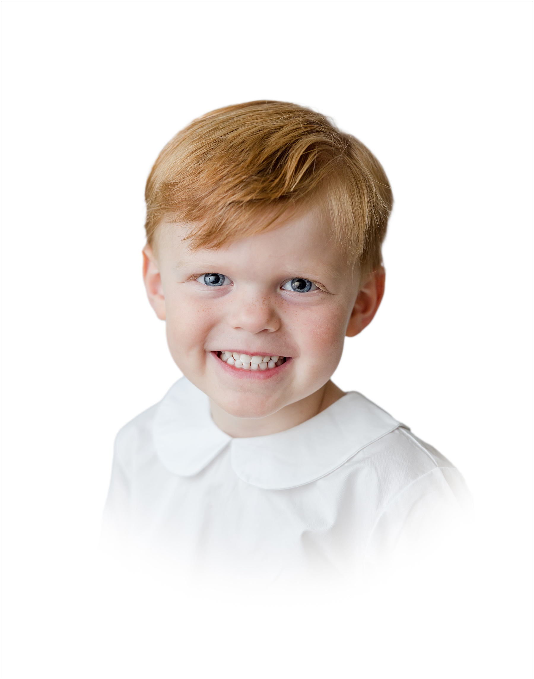 South Carolina heirloom portraits with a white vignette of a red headed young boy.